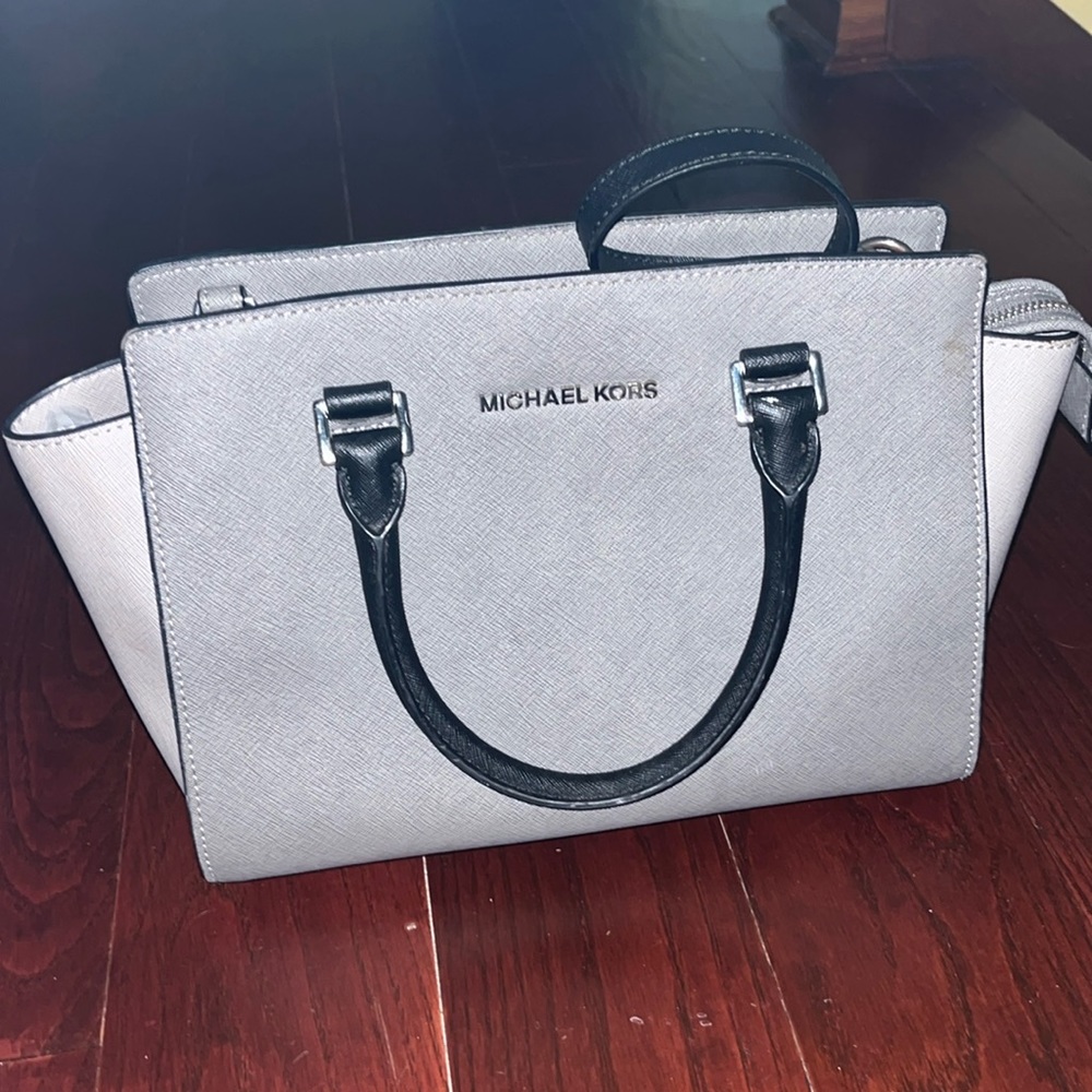 Michael Kors purse barely used black and grey. Will negotiate price